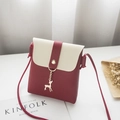 Chic two-tone phone purse in burgundy and cream with a golden deer charm detail - Red