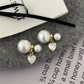 Detailed shot of double pearl heart earrings with clear zircon pendant in gold finish - White (White Zirconia)