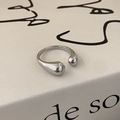 Macro detail of minimalist silver adjustable open ring with asymmetric teardrop design - Ball Style / Silver