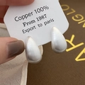 Detailed close-up of matte silver brushed water drop earrings on a Copper 100% card - Water Drop Metal Brushed Silver Style