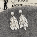 Elegant silver leaf tassel earrings with white pearls and long metal fringe pendants - White Shell Pearl Metal Leaf Tassel Earrings - Gold Plated