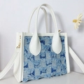 Blue and white checkered denim tote bag with frayed edges and white leather handles - Checkerboard Denim Fringe Style