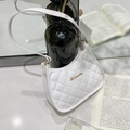 White quilted hobo shoulder bag with gold logo on French style aesthetic background - Quilted White