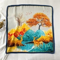 Detailed flat lay of a square silk scarf featuring golden deer and mountain landscape - Golden Deer Mountain Style (FJ457-2)