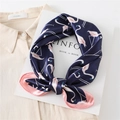 Navy blue silk square scarf with pink flamingo pattern on a beige shirt background - 60x60cm / Navy Blue (FL16-6)