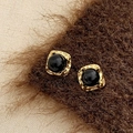 Detailed macro view of vintage gold hammered earrings with large black onyx studs - Gold Black Pearl Square Stud Earrings