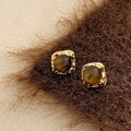Close-up of golden geometric earrings featuring brown gemstones and hammered textures - Gold Tiger Eye Square Stud Earrings