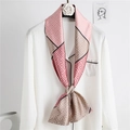 Pink and beige geometric pattern long silk scarf tied as a bow on a white shirt - Pink Camel Geometric Pattern