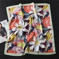 Detailed view of floral pattern silk square scarf with mint green border on black background - Light Green Border Style (FJ317-2)