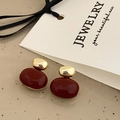 Detail shot of vintage burgundy oval drop earrings with polished gold-tone metal accents - Wine Red Drip Oil Earrings - Gold Plated Copper (A-416)