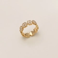 Detail view of golden daisy ring with white enamel flower petals and minimalist design - White Flower Gold Open Ring