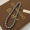 Detail of grey pearl necklace featuring a silver lobster clasp and extension chain - High Luster Grade / 10mm