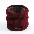 Detail of burgundy knitted neck warmer with thick plush lining and white embroidery - Burgundy