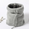 Detail of grey knitted neck warmer featuring plush fleece lining and adjustable drawstring - Light Gray