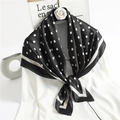 Elegant black silk square scarf with white polka dots tied on a white shirt collar - 90x90cm / Black