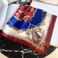 Flat lay of silk square scarf with chain print on marble table with fashion accessories - 70x70cm / Wine Red Edge