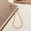 Détail du collier de perles avec perles orange, coquilles bambou et fermoir argenté - Collier de Perles en Bambou Coquille Agate Rouge (B-146)