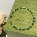 Detail of green chalcedony beads and pearls necklace with a silver heart clasp - Alternating Chalcedony and Pearl Style