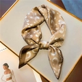 Golden bronze satin square scarf with paisley pattern tied in a stylish bow - Golden Brown Paisley Style (FJ550-3)