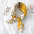 Detail of elegant chain pattern silk scarf in ginger yellow and ivory white on white fabric - Ginger Ivory White Chain (FX-205)