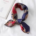 Detailed view of the luxury chain and tassel print on a silk-like square neck scarf - Navy Blue Red Gold (FX-207)