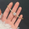 Macro shot of gold-plated bracelet with square-cut sugar zircon and pavé setting details - Gold