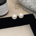 Macro detail of French vintage pearl earrings with micro-set zircon in a gold halo - One Pair / Gold Sunflower Stud Earrings