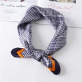 Houndstooth square silk scarf in navy blue and white with vibrant orange border trim - Navy Blue