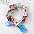 Detail of floral silk scarf with hand-painted patterns and fine rolled edges - 60x60cm / Sky Blue