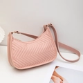 Pink quilted hobo shoulder bag for women with V-shaped stitching and elegant crescent shape - Pink