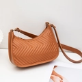 Brown faux leather shoulder bag with V-shaped quilting and a minimalist zipper design - Tan