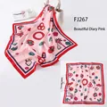 Pink silk square scarf with colorful crown patterns and red borders for women - Pink