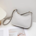 Minimalist light grey shoulder bag with V-shaped chevron quilting and metal zipper - Gray