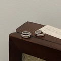 Close-up of minimalist silver double-layer hoop earrings on a vintage wooden box - Silver Plain Hoop Earring