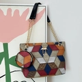Chic cylinder crossbody bag with colorful geometric patchwork and flamingo hardware - Contrast Color