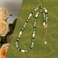 Detail of vintage beaded necklace with malachite beads, freshwater pearls and gold clasp - Freshwater Pearl Natural Stone Vintage Necklace
