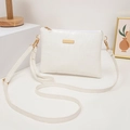 White faux leather crossbody bag featuring crocodile texture and gold hardware details - White