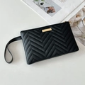 Chic black long wallet for women with chevron quilting and golden zipper closure - Black