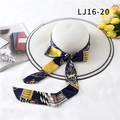 White straw sun hat featuring a navy blue patterned ribbon tie with architectural prints - Navy Print (LJ16-20)