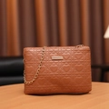 Brown faux leather mini crossbody bag featuring heart quilted patterns and gold chain strap - Brown (Heart Quilted)