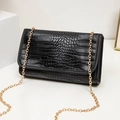 Black crocodile embossed leather crossbody bag with elegant gold chain shoulder strap - Crocodile / Black
