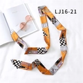 Orange long narrow scarf with checkered art patterns tied in an S-shape on white background - Orange Art Illustration (LJ16-21)