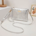 Silver crocodile embossed crossbody bag with gold hardware and detachable shoulder strap - Silver