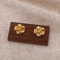 Macro shot of gold camellia flower stud earrings with layered metallic petals - Flower Petal Studs (Real Gold Plated) / Gold