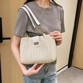 Women's straw woven shoulder bag with white leather trim and gold twist lock clasp - White