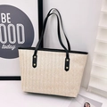 Woven straw tote bag with black leather handles and gold studs for women - Black