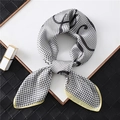 Close-up of houndstooth silk scarf with geometric pattern and contrast border trim - 70*70cm / Yellow Border/FJ161-1