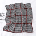 Close-up of red plaid houndstooth silk scarf on white fabric with decorative cards - Black White Houndstooth Red Grid Style (FX-135)