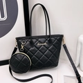 Quilted black tote bag set with matching coin purse and gold hardware detailing - Black