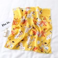 Detail of yellow silk scarf with floral and butterfly prints laid on white cloth - Bright Yellow Butterfly Floral Style (FX-128)